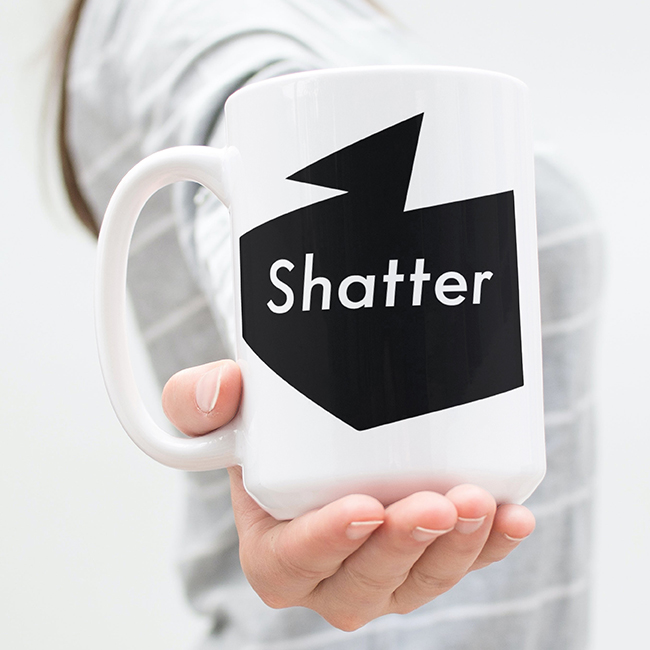 Mug with the shatter logo designed by Studio Usher